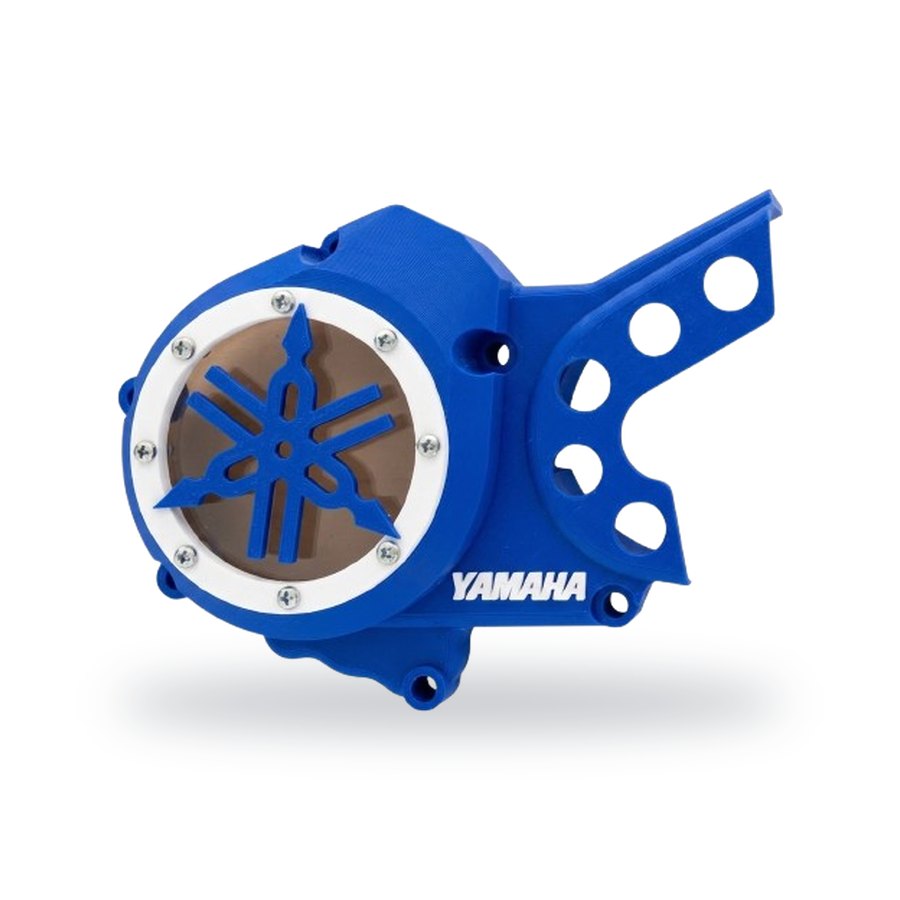 Tampa de motor Yamaha DTR125 com emblema Yamaha sobre janela fumada